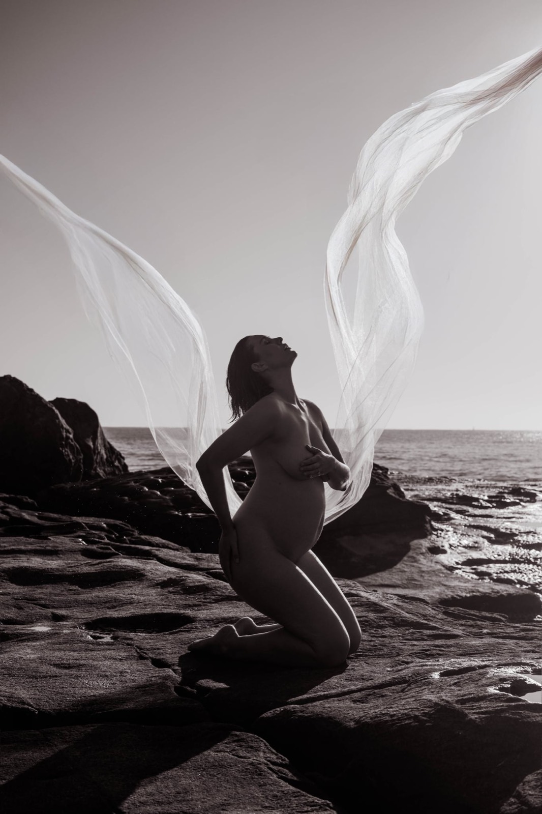 Flowing fabric captured during an editorial coastal portrait session