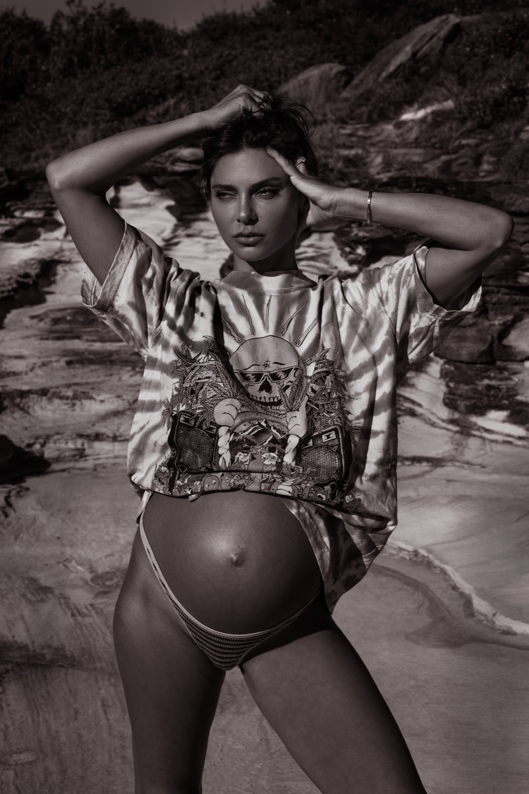 Editorial black and white maternity portrait in a graphic shirt